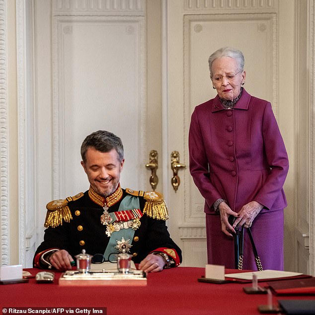 The former monarch watches as her son, King Frederick, signs the declaration on January 14.