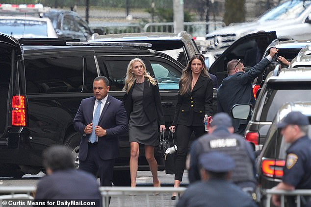 Harp leaves Donald Trump's motorcade in Manhattan on Tuesday with Martin for the second day of the former president's criminal trial.