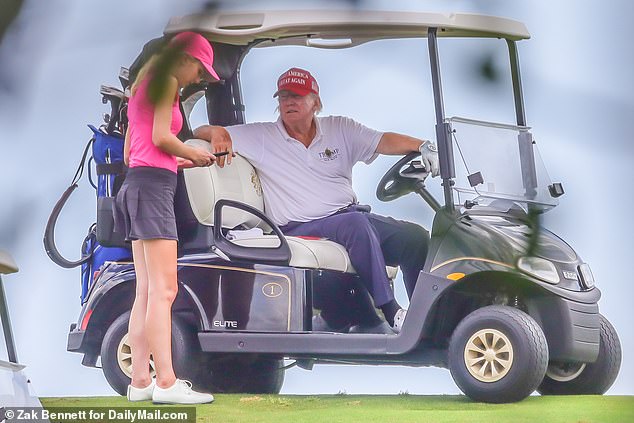 Natalie Harp often joins Trump on the golf course and helps manage his social media. Pictured: Arpa at Trump International Golf Club in West Palm Beach with the former president on March 29, 2023.