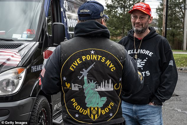 Members of the Proud Boys gather to show their support for Trump earlier this month, ahead of his first criminal trial, the hush money case with Stormy Daniels.