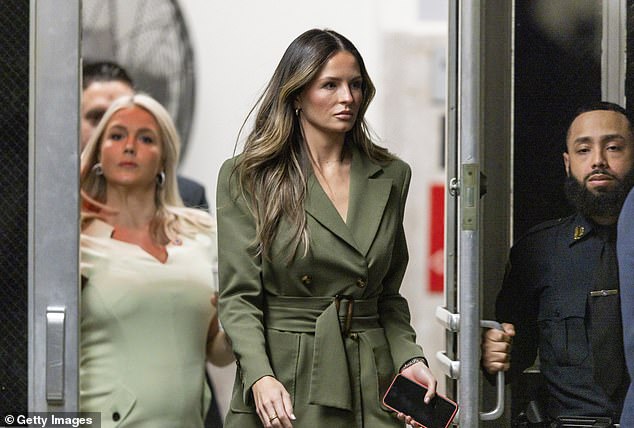 Margo Martin (C), deputy communications director for former US President Donald Trump, enters the courtroom during the second day of his criminal trial at Manhattan Criminal Court on April 16, 2024 in New York City.