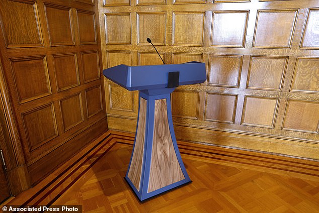 The lectern stands in the corner of the governor's conference room at the state Capitol, Sept. 26, 2023.