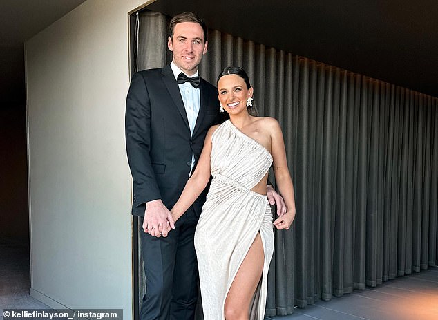 Finlayson (pictured with wife Kellie) received a three-week suspension for a homophobic slur