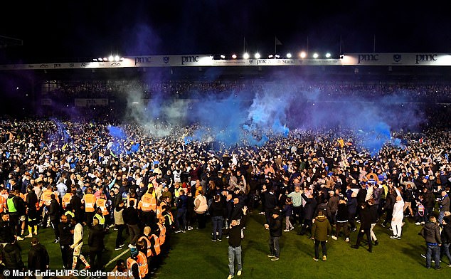 Thousands of fans stormed Fratton Park full time to celebrate winning promotion