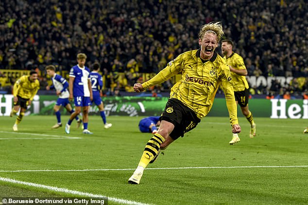 Julian Brandt scored Borussia Dortmund's first goal to help them defeat Atlético Madrid.