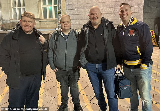 Mark Davies (third from right with friends Tony Murphy, Adam Murphy and Dean Stringfellow) said he was able to pay just £40 for a ticket because he was an Arsenal season ticket holder.