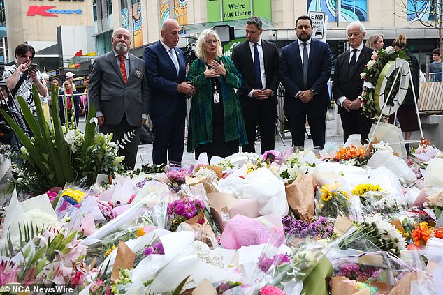 Five women and a security guard were stabbed to death when Joel Cauchi attacked innocent bystanders in a frenzied attack at Westfield Bondi Junction in Sydney's eastern suburbs last Saturday. Pictured: Waverley Mayor Paula Masselos (in green) received support from other mayors from across Sydney outside Westfield Bondi Junction on Wednesday.