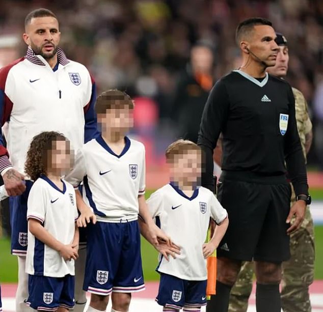 Kyle's three children ran out to Wembley as mascots when England played Brazil last month.