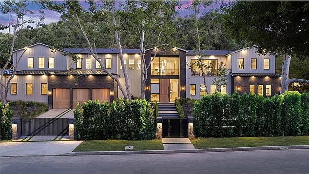 Another stunning sun-drenched property, located in the coveted Encino neighborhood, was devalued by nearly $1 million from $12.9 million in July 2023 to just over $11.9 million today.