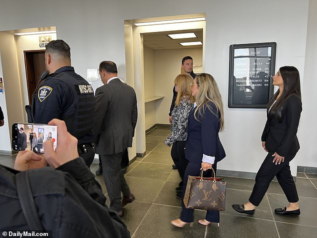 Accused serial killer Rex Heuermann returns to court Wednesday morning, and his ex-wife Asa Ellerup (pictured in a black and white jacket) also appeared at the hearing.