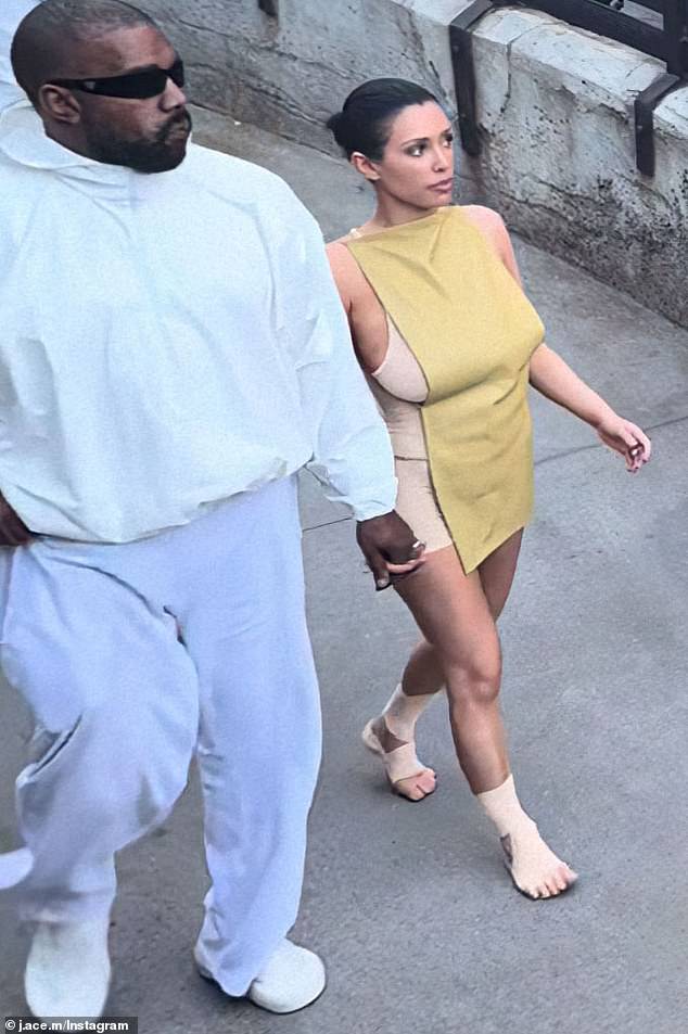 Bianca was wearing a beige jumpsuit covered with a tan flap and was barefoot with only bandages on her feet and ankles.