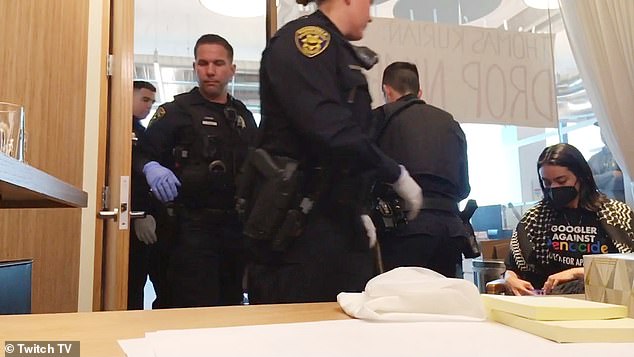 Police officers chased protesters out of Google Cloud CEO Thomas Kurian's office as hundreds of people watched a livestream.