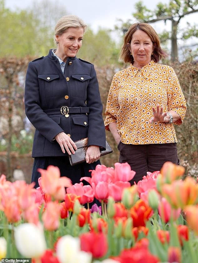 The royals seemed particularly impressed with an elegant tulip display, showing flowers in shades of pink, red, purple and orange.
