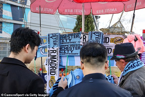 MANCHESTER, ENGLAND – APRIL 17: Fans arrive for the UEFA Champions League quarter-final second leg match between Manchester City and Real Madrid CF at the Etihad Stadium on April 17, 2024 in Manchester, England. (Photo by Alex Dodd – CameraSport via Getty Images)
