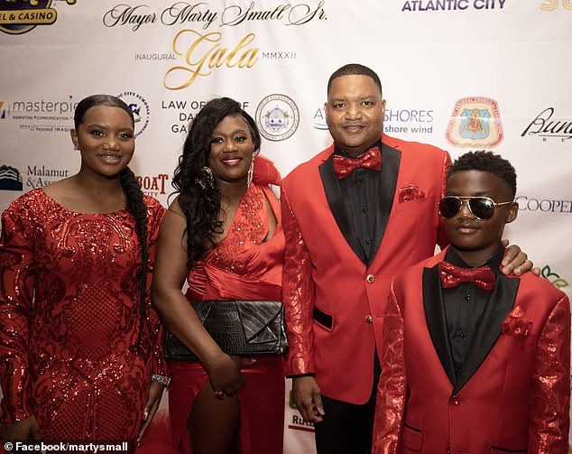 Mayor Small Sr. with his wife and two children