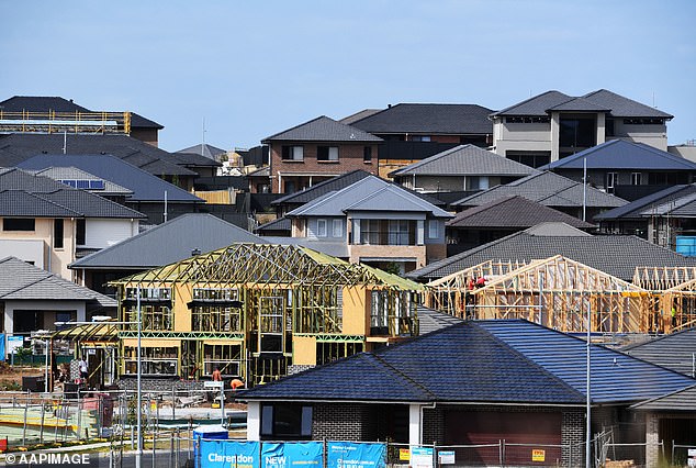 Australia's capital cities also have rental vacancy rates of less than one per cent as construction activity fails to keep pace with growing population growth (pictured are houses under construction in Oran Park, south-west Sydney ).