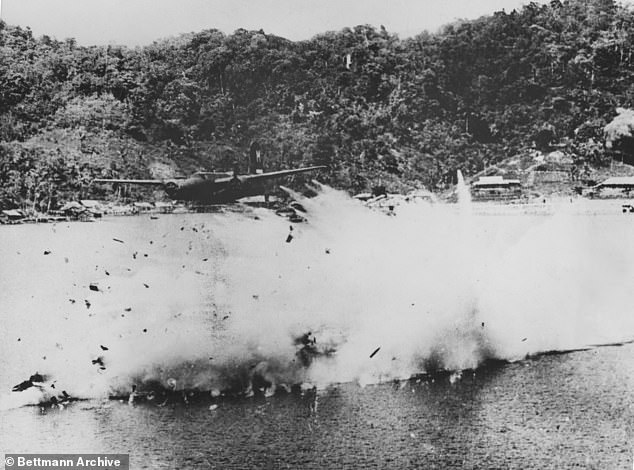 There are no images of Joe Biden's uncle being shot dead. This photograph shows a Douglas A-20 Havoc medium bomber shot down by anti-aircraft fire during an attack on the Imperial Japanese seaplane base and port facilities at Sekar Bay on 22 July 1944 at Kokas, Dutch New Guinea, East Indies Dutch. .