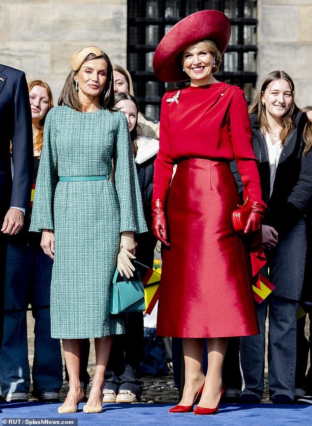 Queen Letizia of Spain (left) and Queen Máxima of the Netherlands (right) looked equally elegant as they attended the welcome ceremony at Dam Square.