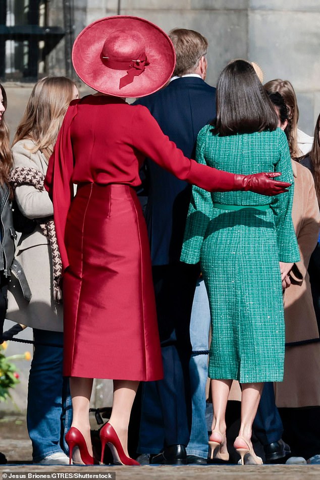 Máxima placed her arm on Letizia's back as she guided the royal through Dam Square in Amsterdam.