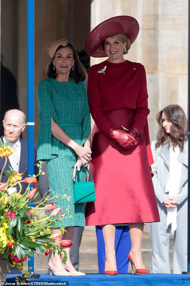 Queen Máxima looked elegant in a striking red suit.  The royal continued the red theme with the addition of a crimson hat and leather gloves.