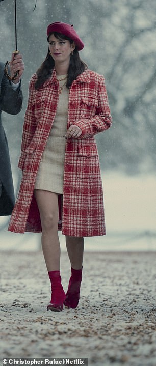 Susie's red plaid tweed coat, from British brand Really Wild, is priced at £595