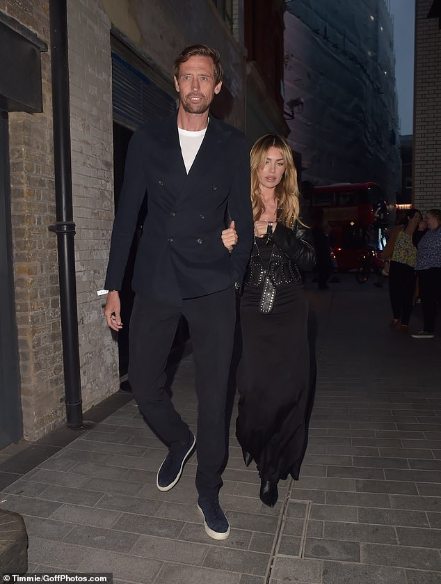 The model put on a display of love for the former professional footballer as they linked arms after the star-studded event.