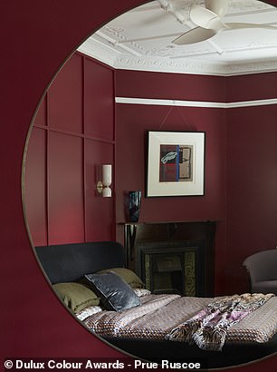 But many go beyond small flashes of red and adorn walls, ceilings, and sometimes entire rooms with this striking hue.