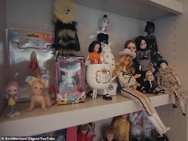 Emma showed off her collection of dolls and whispered: 