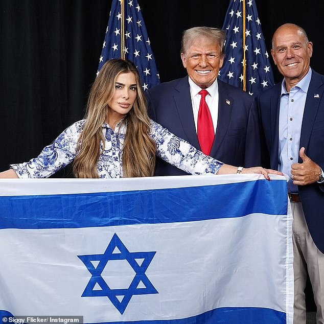 Flicker has made no secret of her support for Donald Trump and her Instagram profile picture (pictured) shows her with the former president and her husband Michael Campanella, holding the Israeli flag.