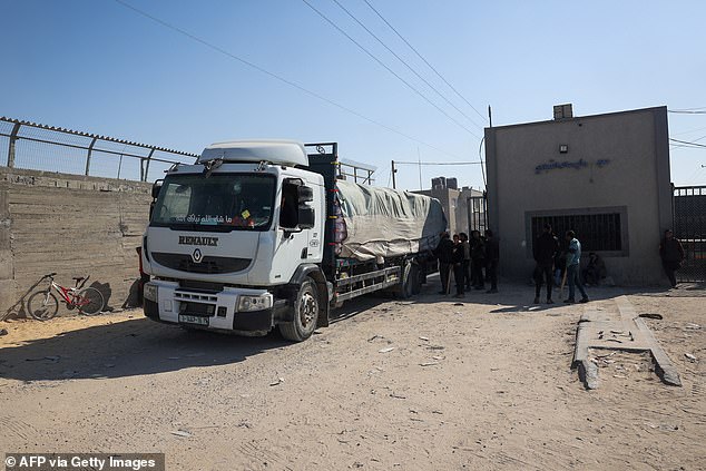 A truck carrying humanitarian aid arrives for processing at the Kerem Shalom (Karm Abu Salem) border crossing on April 15.