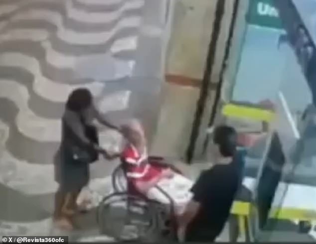 At one point in the video, a man wearing a black T-shirt can be seen approaching the couple and speaking to Braga before Souza intervenes and begins to readjust his wheelchair.