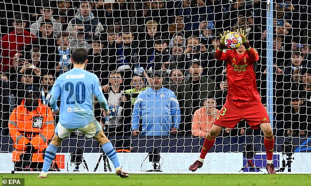 Bernardo Silva's high shot in the center was easily stopped by the Madrid goalkeeper