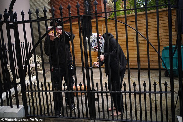 One member of the group, a 28-year-old bar worker originally from Liverpool, told MailOnline that the squatters had not yet moved.