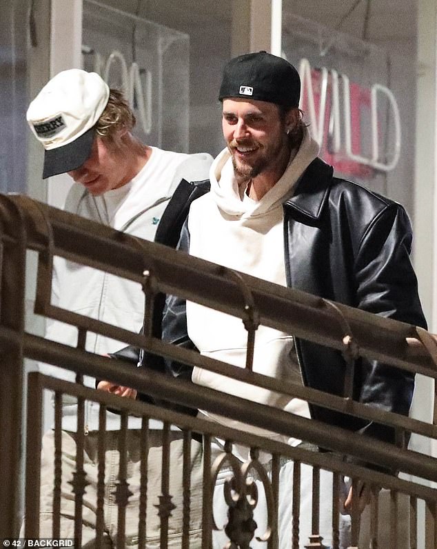 Justin, who was not accompanied by his wife Hailey Bieber, 27, seemed in good spirits as he turned his baseball cap backwards.