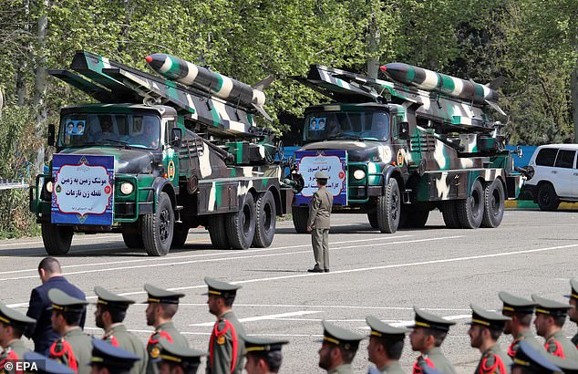 Iranian 'Nazeat' medium-range missiles are displayed during the annual Army Day celebration at a military base in Tehran, Iran, April 17, 2024.