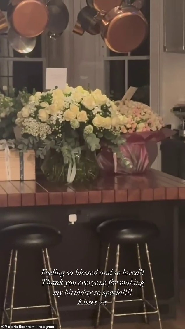 Victoria moved the camera across the room while showing the various vases filled with white, yellow and pink roses, as well as the silver balloons that were placed.