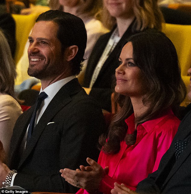 The royal couple smiled as they attended the Neuropsychiatric Disabilities forum at the Karolinska Institute today.