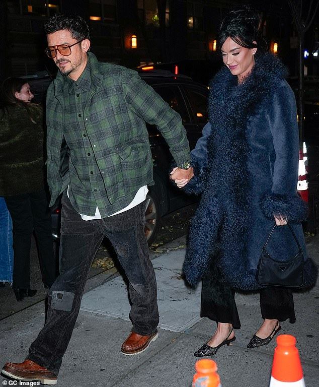 The 47-year-old heartthrob, who has been in a relationship with Katy since 2016, added that 'I wouldn't change it for anything'; photographed in New York in November 2023