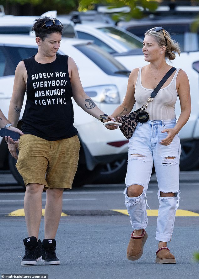 Natalie, who came out as queer last year, went braless in a cream T-shirt, baggy ripped jeans and Ugg boots, while she accessorised her look with a leopard-print clutch and understated jewellery.