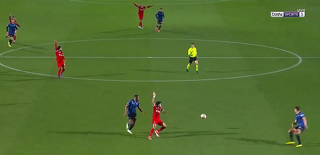 The Reds players immediately appealed and the defender was shown a yellow card but allowed to remain on the field.
