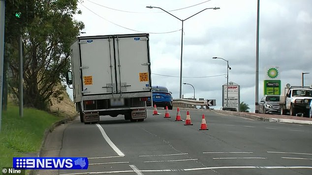 Her mother was pushing the three-year-old girl in a stroller as they crossed the road at an intersection in Browns Plains, south of Brisbane (pictured, the truck).