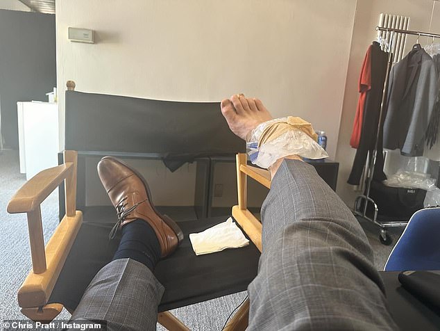 He shared a snapshot of the actor putting his feet up in a director's chair, with an ice pack on his injured right ankle.