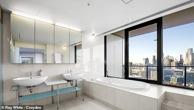 Located on the 40th floor of Tower Five of the luxury Yarra's Edge complex, the stylish apartment offers incredible views of the Melbourne skyline.