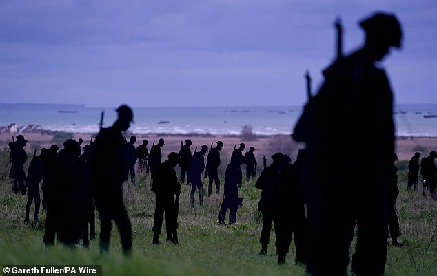 The staggering number of silhouettes represents the number of fatalities under British command on June 6, 1944.