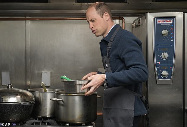 Prince William prepares bolognese sauce at Surplus to Supper in Sunbury-on-Thames today