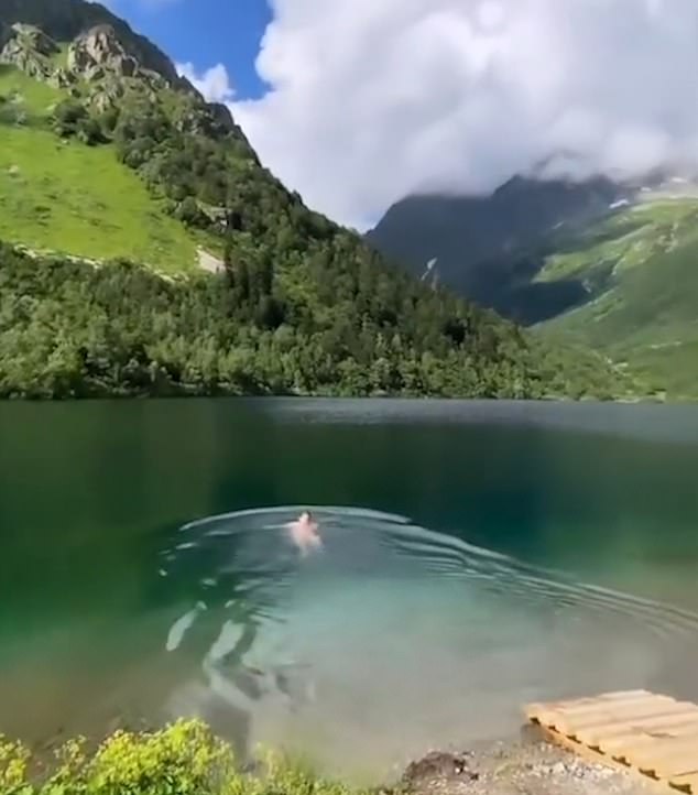 The stunning lake he was filmed swimming in is close to Vladimir Putin's summer dacha.