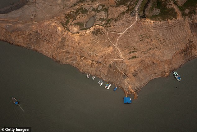 Aerial view of the pier of the El Guavio reservoir, one of the water sources of the Colombian capital, Bogotá, where the water level has visibly decreased due to a drought that has lasted several months due to the El Niño weather pattern.