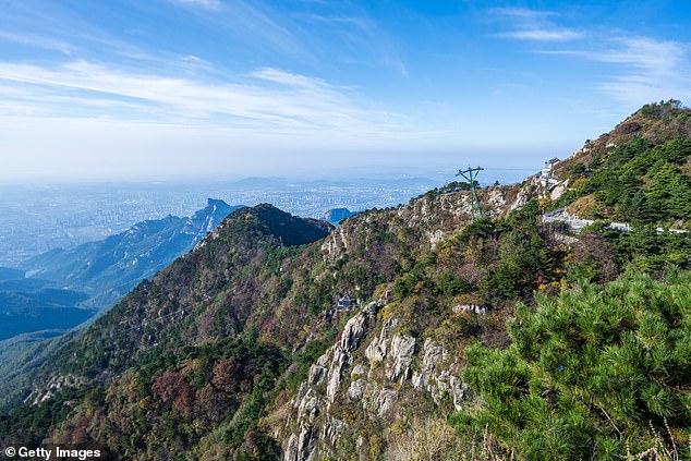Mount Tai, declared a World Heritage Site by UNESCO and located in the Chinese province of Shandong, is famous for its stunning beauty, but conquering its summit is no easy task (file image)
