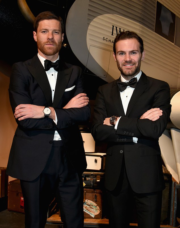 Alonso photographed with Juan Mata at the launch of an IWC Schaffhausen watch in Geneva in 2016