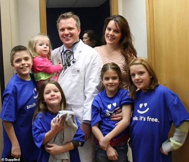 Angela and Craig are pictured with five of their six children.  Angela's brother said: 